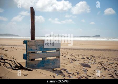 Llangennith Beach, Swansea, UK. 5th July, 2020. Beach one way system access signs at the entrance to Llangennith beach on the Gower Peninsula near Swansea as the lockdown in Wales continues. Credit: Phil Rees/Alamy Live News Stock Photo