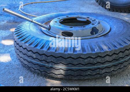 New tires are going to change the car. new truck tires lie on the ground Stock Photo