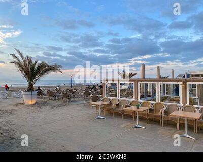 Zandvoort, Netherlands - October 5,2019: Sunset on the beach in Zandvoort. It is a popular beach destination located near to Amsterdam, with clean san Stock Photo