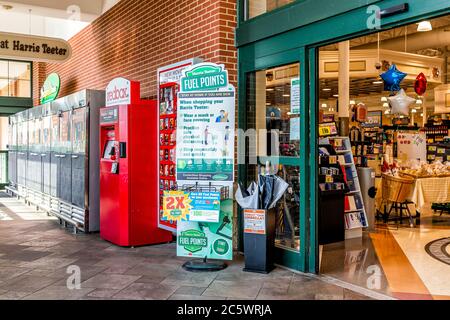 Warrenton, USA - June 9, 2020: Sign entrance by open doors for fuel points and coronavirus tips at Harris Teeter Kroger grocery store business in Virg Stock Photo