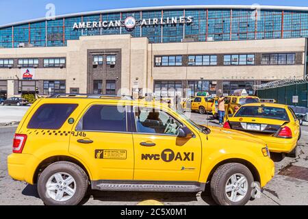 New York City,NYC NY Queens,LaGuardia Airport,LGA,ground transportation,American Airlines terminal exterior,taxi stand,yellow cab,cabs,car,vehicle,SUV Stock Photo