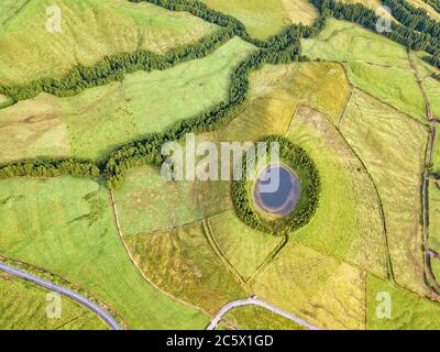 Abstract shape formes. Aerial view of lagoon in the Azores islands. Drone landscape view with lines and textures in the background. Top view of volcan Stock Photo