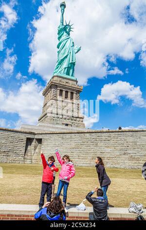 New York,New York City,NY NYC,Upper Bay water,Statue Cruises,Statue of Liberty National Monument,Liberty Island,freedom,symbol,Bartholdi,sculptor,torc Stock Photo