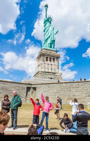 New York,New York City,NY NYC,Upper Bay water,Statue Cruises,Statue of Liberty National Monument,Liberty Island,freedom,symbol,Bartholdi,sculptor,torc Stock Photo