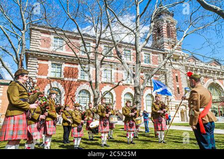 New York City,NYC NY Statue of Liberty National Monument,Ellis Island Immigration Museum,historic building,outside exterior,front,entrance,Scots Guard Stock Photo