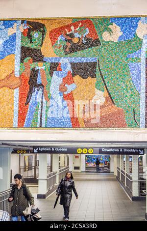 New York City,NYC NY Manhattan,Midtown,MTA,New York City,Subway system,Times Square Station,N Q R highway Route,Broadway Line,Black woman female women Stock Photo