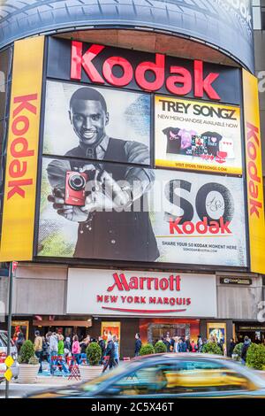 New York City,NYC NY Manhattan,Midtown,Times Square,Marriott Marquis,hotel,entrance,illuminated sign,ad,advertise,Kodak,global company,camera,digital, Stock Photo