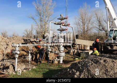 Preparation of a gas well for overhaul. Stock Photo