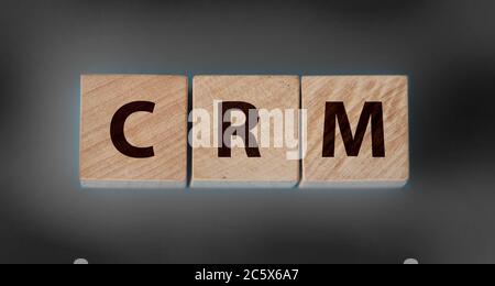 CRM, Customer Relationship Management on wooden blocks business concept Stock Photo