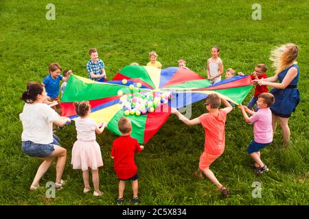 Kids in a circle playing social game Stock Photo