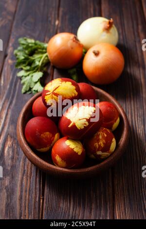 Colored eggs according to the old method with peeled onions Stock Photo