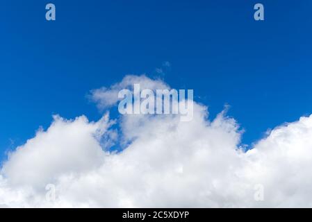 View of the blue sky and white clouds before heavy rain. Stock Photo