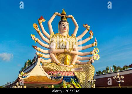 Statue of Shiva in Wat Plai Laem Temple, Samui, Thailand in a summer day Stock Photo