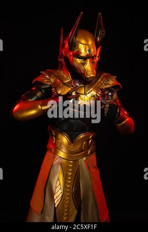 a male actor in a suit of an Egyptian mythology character, the golden ...