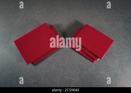 Two piles of covers on a dark background close-up. Stock Photo