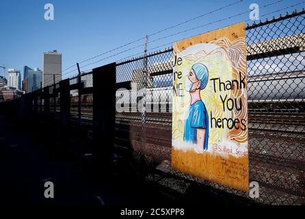 Vancouver, Canada. 5th July, 2020. A mural is seen during the Murals of Gratitude Exhibition at Gastown in Vancouver, British Columbia, Canada, July 5, 2020. The exhibition showcased 35 murals completed by more than 20 artists to honour the frontline health workers fighting against the COVID-19 pandemic. Credit: Liang Sen/Xinhua/Alamy Live News Stock Photo