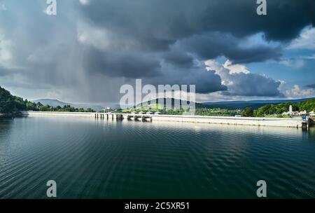 The Solina Dam - largest dam in Poland located on lake Solina. Hydroelectric power plant in Solina, Bieszczady Mountains. Stock Photo