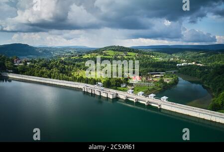 The Solina Dam - largest dam in Poland located on lake Solina. Hydroelectric power plant in Solina, Bieszczady Mountains. Stock Photo