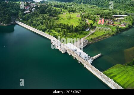 The Solina Dam - largest dam in Poland located on lake Solina. Hydroelectric power plant in Solina, Bieszczady Mountains. Stock Photo