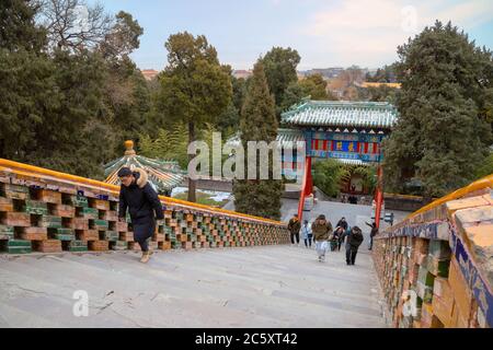 Beijing, China - Jan 11 2020: Yongan temple (Temple of Everlasting Peace) situated in the heart of Beihai park in Jade Flower Island. It's home to the Stock Photo