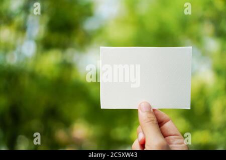 Copy space of white paper on nature background. Use for put text on blank space. Stock Photo