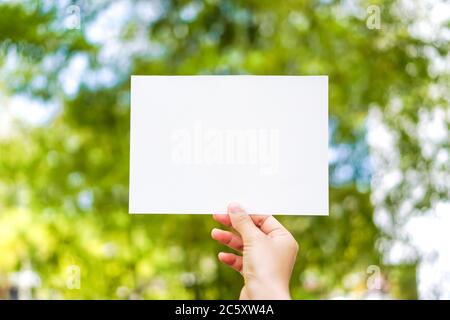 Copy space of white paper on nature background. Use for put text on blank space. Stock Photo