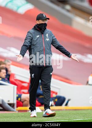 Liverpool. 6th July, 2020. Liverpool's manager Jurgen Klopp wears a face covering during the Premier League match between Liverpool and Aston Villa at Anfield in Liverpool, Britain on July 5, 2020.FOR EDITORIAL USE ONLY. NOT FOR SALE FOR MARKETING OR ADVERTISING CAMPAIGNS. NO USE WITH UNAUTHORIZED AUDIO, VIDEO, DATA, FIXTURE LISTS, CLUB/LEAGUE LOGOS OR 'LIVE' SERVICES. ONLINE IN-MATCH USE LIMITED TO 45 IMAGES, NO VIDEO EMULATION. NO USE IN BETTING, GAMES OR SINGLE CLUB/LEAGUE/PLAYER PUBLICATIONS. Credit: Xinhua/Alamy Live News