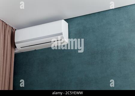 Air conditioner in living room. Shallow dept of field. Stock Photo