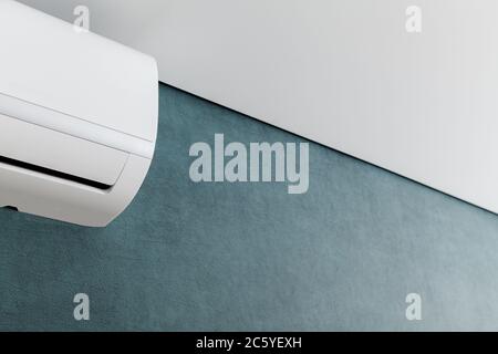 Air conditioner on green wall. Closeup image. Shallow dept of field. Stock Photo