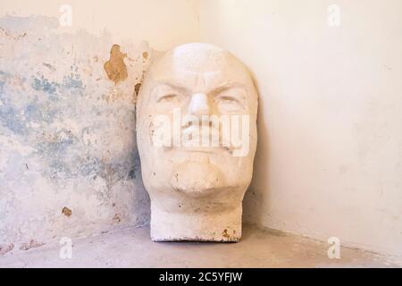 A bust of Lenin in a former prison building used by the German Nazis during WWII as a concentration camp headquarters. In Macikai, Lithuania. Stock Photo