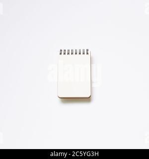 Empty notebook on white background. top view, copy space Stock Photo