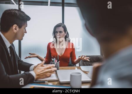Woman explaining divorce reasons to a lawyer Stock Photo