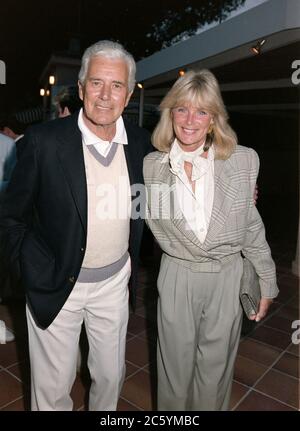 ARCHIVE: MONACO:  JUNE 1988: Linda Evans & John Forsythe at celebrity tennis tournament in Monaco. File photo © Paul Smith/Featureflash Stock Photo