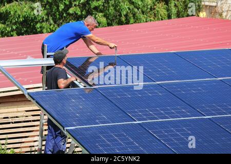 Installation of semitransparent solar modules Stock Photo
