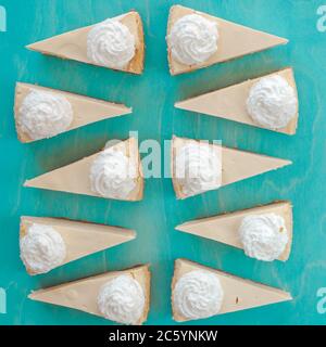 cheesecake pattern, servings of cheesecake on a blue background Stock Photo