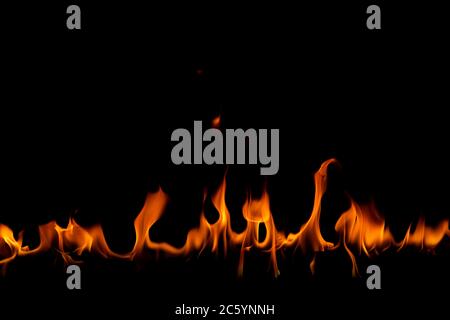 Fire flames on the black background Stock Photo