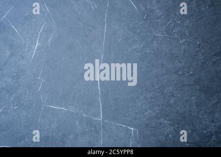 Blue scratched stone texture on background. Texture wallpaper Stock Photo