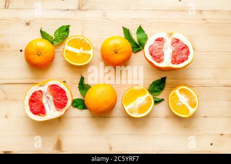 Grapefruits and oranges on wood top view Stock Photo