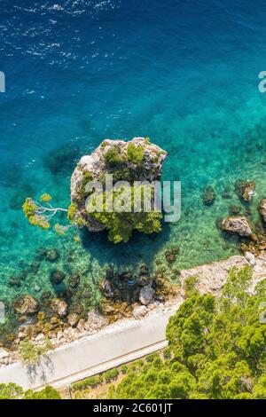 Famous Punta Rata beach with little island in Brela, Dalmatia, Croatia Stock Photo