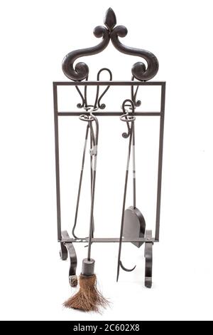 Vintage fireplace set on a decorative stand Stock Photo