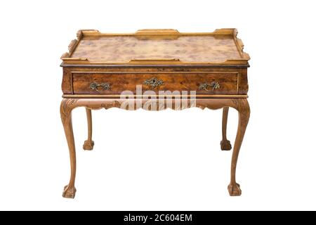 Antique wooden table with drawer on the white background. Stock Photo