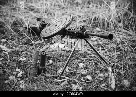 old black color machine gun on a tripod rear view isolated on white ...