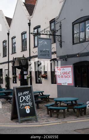 It's Great To Be Back sign on outside wall of pub. Ye Olde White Harte. Kinver. July 5th 2020. Covid-19 Pandemic. UK Stock Photo