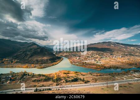 Mtskheta, Georgia. Top View Of Ancient Town Located At Valley Of Confluence Of Rivers Mtkvari Kura And Aragvi In Picturesque Highlands. Autumn Season.