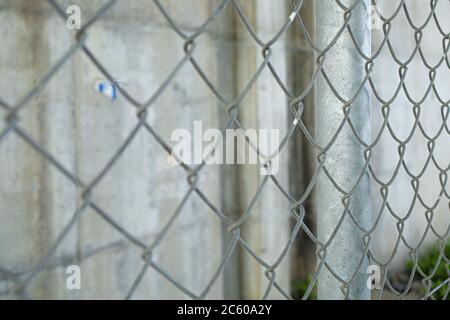 An old wire mesh with a diamond pattern. Stock Photo