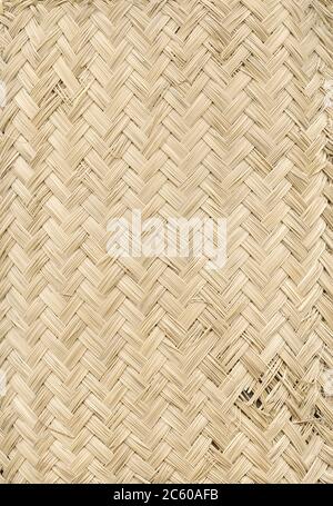 Woven light bamboo mat texture background Stock Photo