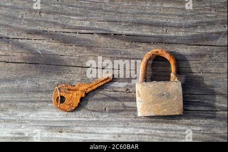 little old rusty padlock with key Stock Photo