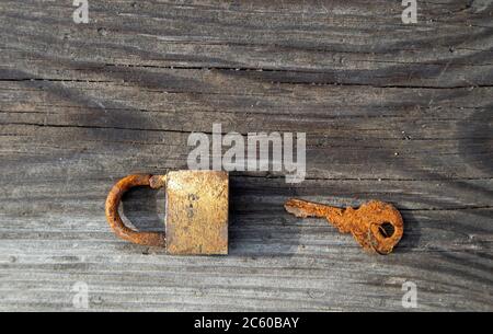 little old rusty padlock with key Stock Photo