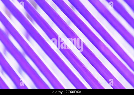Defocus, close-up of stripped palm leaves, abstract pastel ultra violet made of green palm leaves for creative backdrop. Stock Photo
