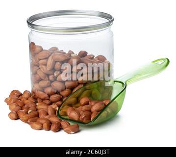 Peeled peanuts in a jar isolated on white Stock Photo